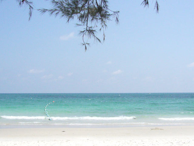 Blue water, white sand. What else do you want, a beer as well? Forget abou...oh, here you go.