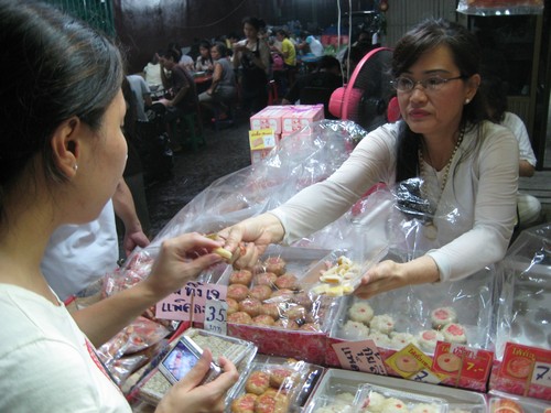 Taking a sample from a vendor, who are usually more than willing to give you a taste for free. Kind of like crack dealers!