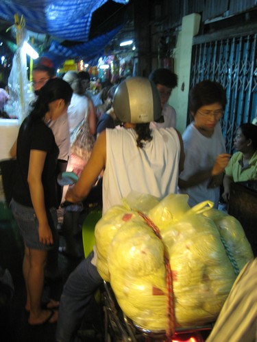What's the best way to get 100kg of noodles through a crowded alley? Motorbike!