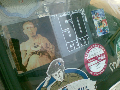 This one isn't one sticker, but I thought it was an interesting placement of two different ones. A Monk - highly revered and admired in Thailand - and a sticker for 50 Cent. Maybe the tuk-tuk driver aspires to some type of monastic thug life?