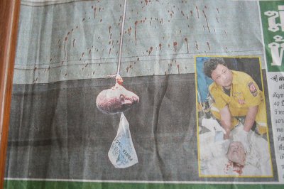 Another front page image, this time of the gruesome suicide/murder (depends who you ask) of an expat in Bangkok. What is an image like this doing on the front page of a paper? From Isaan Style.