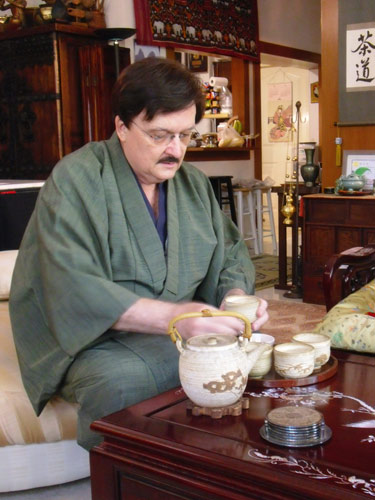 John preparing the first round of tea.