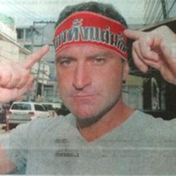 His headband reads: Douchebag Crossing.