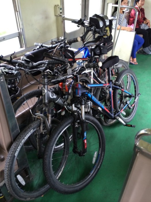 Our bikes bungee'd up real good on the train ride down. 10 baht per person, 20 baht per bike.